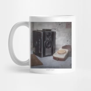 An old vintage camera with external exposure meter, as a poster Mug